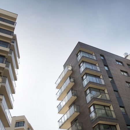 residential-building-sky-background-facade-modern-housing-construction-with-balconies